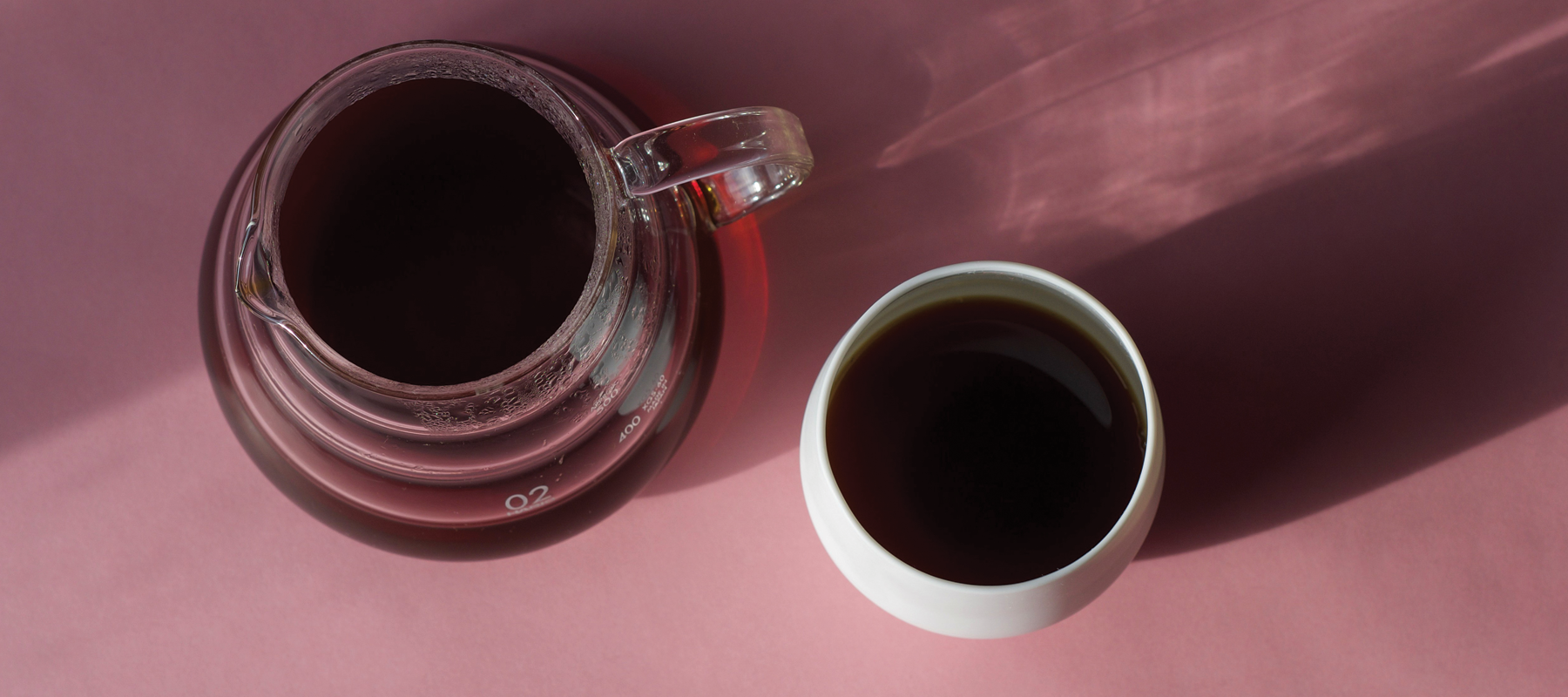 Coffee Cup on Pink Background