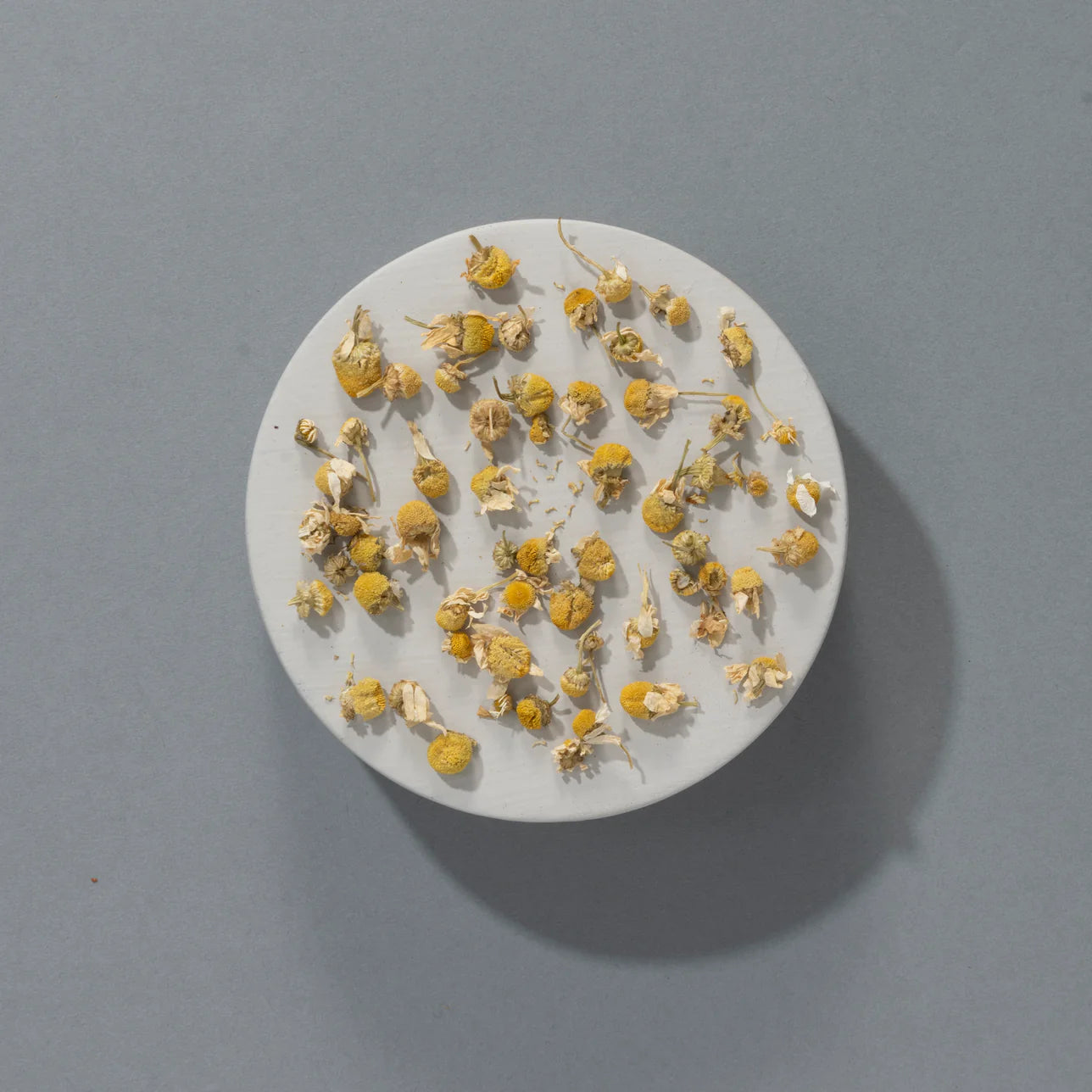 These whole chamomile flowers brew into a calming herbal infusion with delicate floral notes and a natural sweetness reminiscent of melon or honeydew. It’s naturally caffeine-free, soothing, and often enjoyed in the evening to promote relaxation and restful sleep.